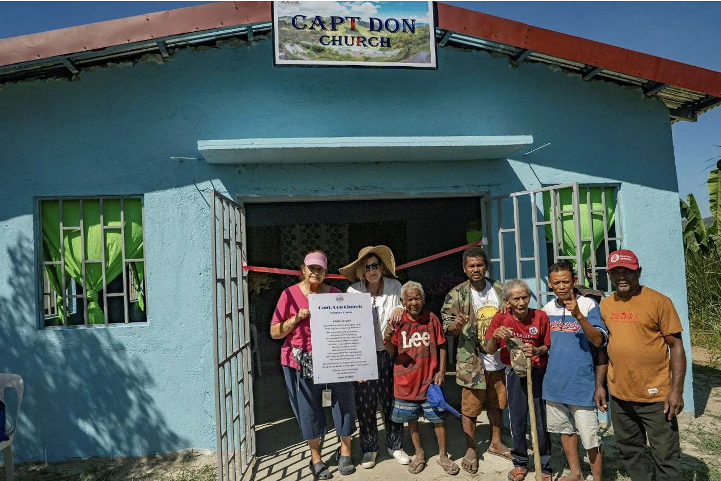 Community members and visitors outside Capt. Don Chapel