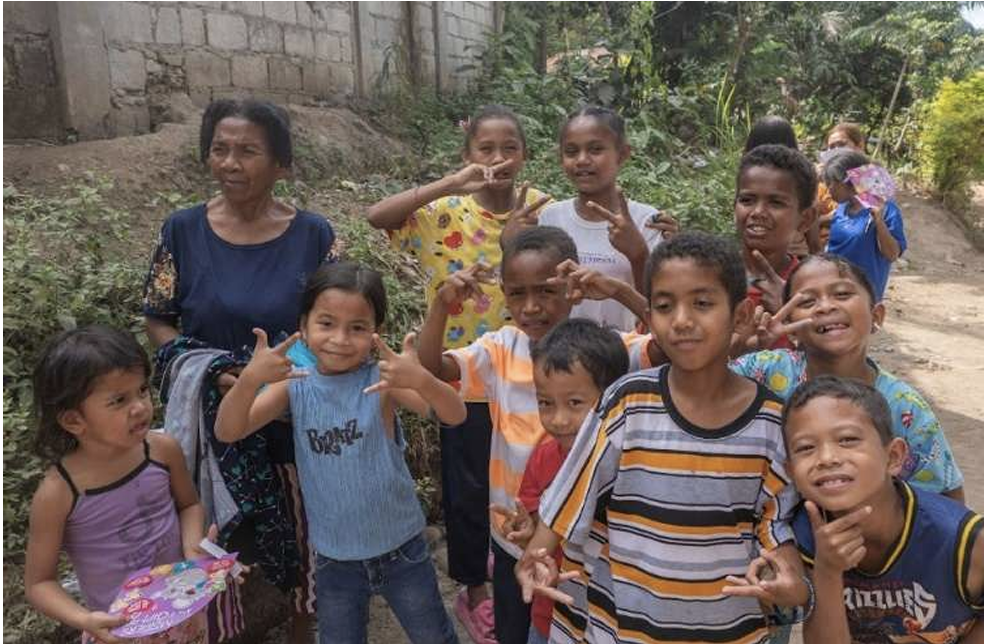 Children and community members at Jean Chapel