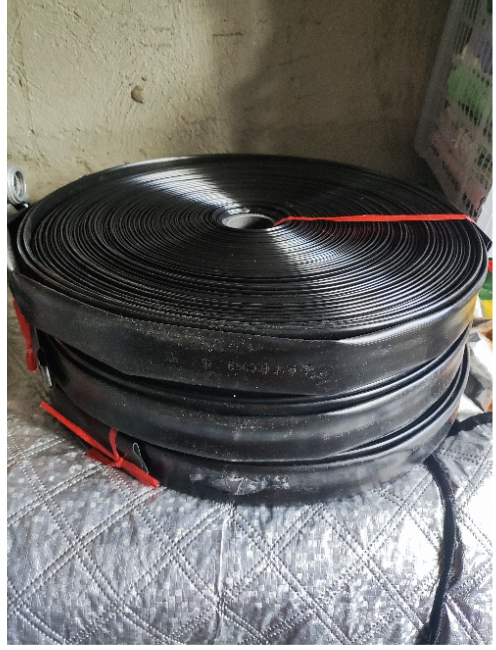 Water hose for Keith Chapel's clean water project