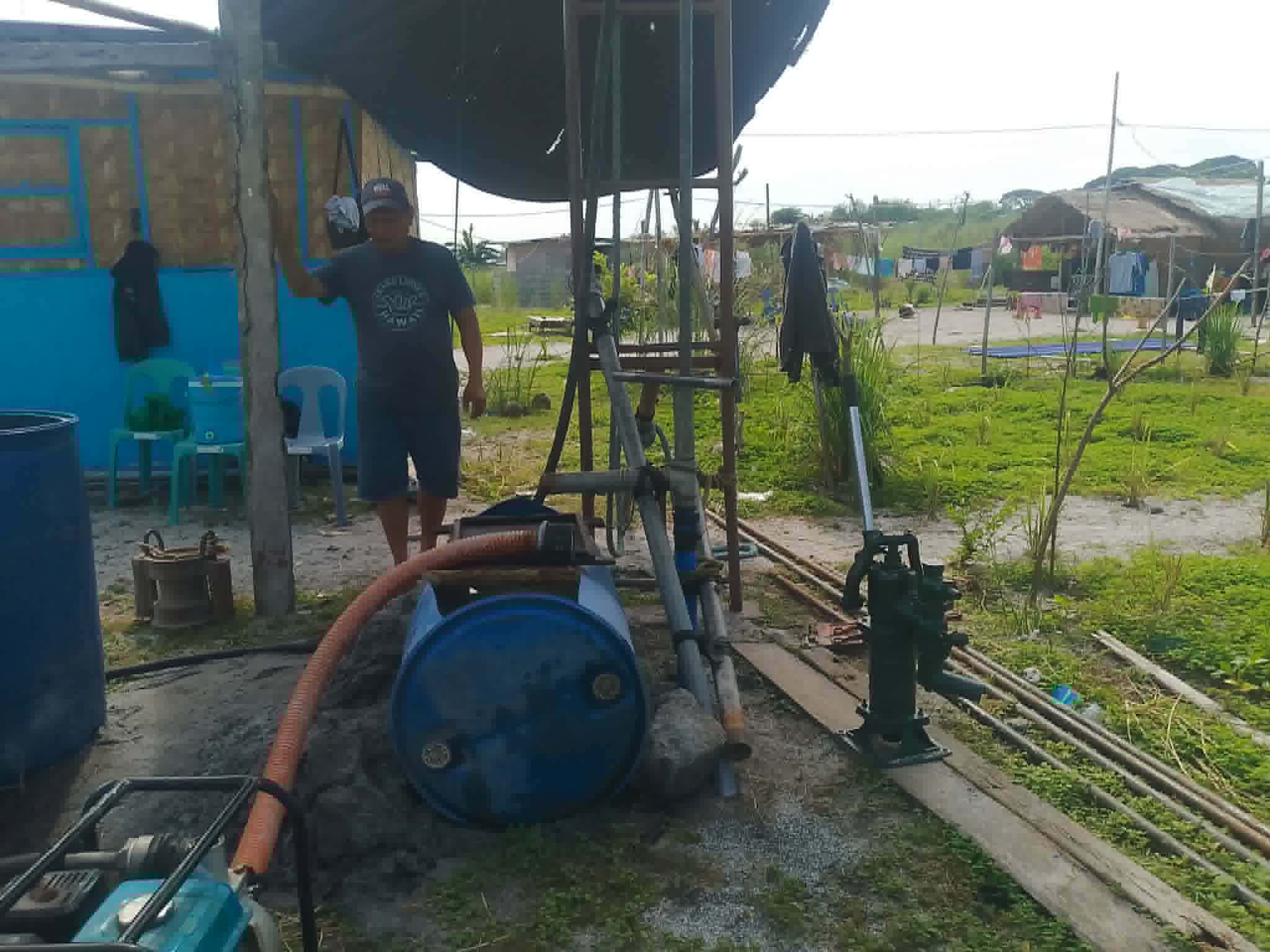 Water project equipment beside the Paul Chapel community